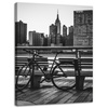 Canvas Print Architecture Bicycle against the background of the city 30x40 cm
